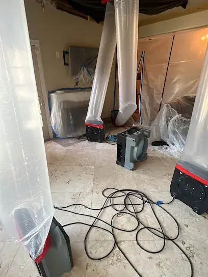 Flooded basement being pumped out in Brockton, MA